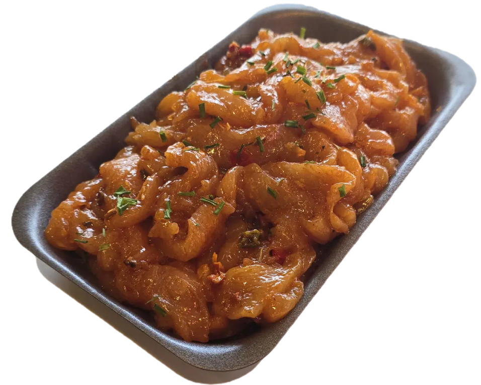 Bakje met gekruide kipreepjes van Slagerij Ophuis, ambachtelijk bereid en onderdeel van het Piggy spaarsysteem.