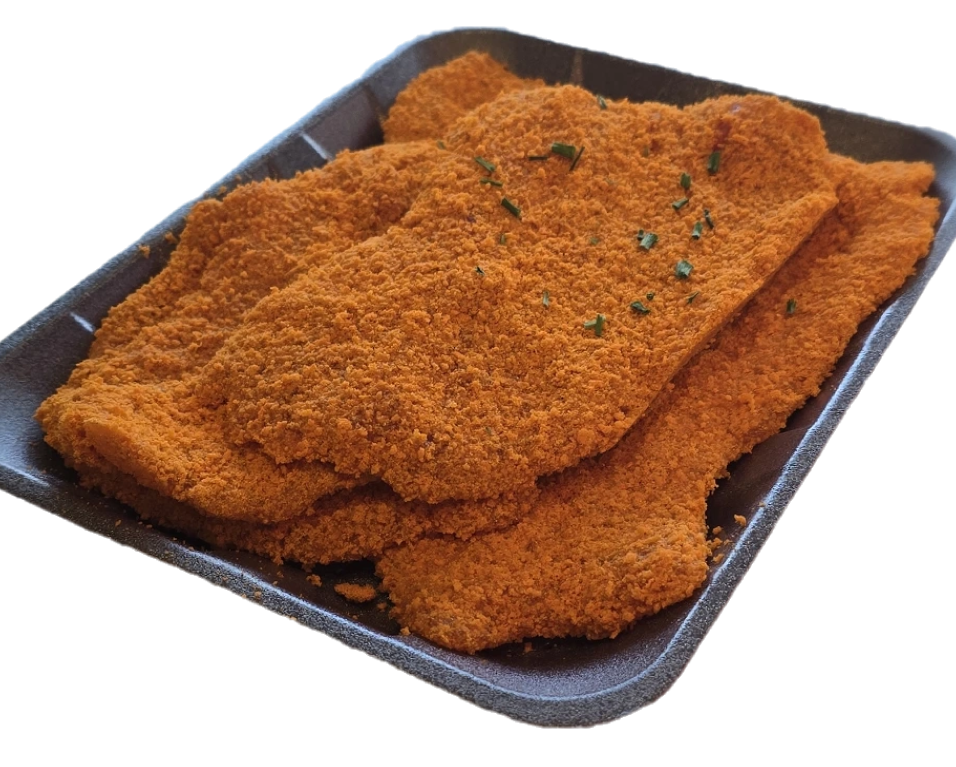 Bakje met verse schnitzels van Slagerij Ophuis, ambachtelijk gepaneerd en onderdeel van het Piggy spaarsysteem.